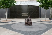 A life-size bronze statue of African-American civil-rights stalwart Rosa Parks, sitting on a bus bench, the focal point of a plaza at a Dallas Area Rapid Transit, or DART, station that was completed in 2009 in Dallas.