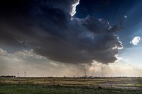 A massive cloud presages a thunderstorm above Groom, a tiny community along old U.S. Route 66 in the Texas Panhandle. Original image from Carol M. Highsmith’s America, Library of Congress collection. Digitally enhanced by rawpixel.