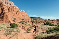 A mountain biker tests a rugged path amid the rock formations in Palo Duro Canyon State Park in the Texas Panhandle. Original image from Carol M. Highsmith&rsquo;s America, Library of Congress collection. Digitally enhanced by rawpixel.