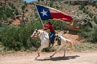 A highlight of the &quot;Texas&quot; outdoor musical drama, staged in the Pioneer Amphitheater carved from the rocks of Palo Duro Canyon southeast of Amarillo in the Texas Panhandle, are majestic rides along the canyon rim by Paul Lundergeen, aboard his white stallion, Ghost.