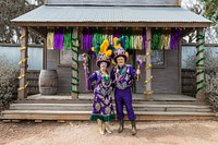 Stella Tedesg and James M. McGroarty, the Queen and King of Mardi Gras — a Cowboy Mardi Gras — outside the 11th Street Cowboy Bar in little Bandera, the "Cowboy Capital of Texas," west of San Antonio.