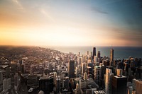 View of Chicago skyline from Willis Tower (formerly Sears Tower) at sunset, looking north-northeast. Original public domain image from Wikimedia Commons