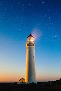 Starry sky and beautiful lighthouse. Original public domain image from Wikimedia Commons