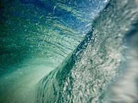 A spectacular view from the inside of a huge swirling sea wave. Original public domain image from Wikimedia Commons