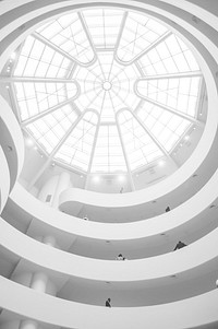 A white dome in the ceiling of a modern building. Original public domain image from <a href="https://commons.wikimedia.org/wiki/File:Modern_white_dome_(Unsplash).jpg" target="_blank" rel="noopener noreferrer nofollow">Wikimedia Commons</a>
