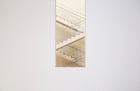 Long shot of zig zag staircase through window in white wall. Original public domain image from <a href="https://commons.wikimedia.org/wiki/File:White_staircase_(Unsplash).jpg" target="_blank">Wikimedia Commons</a>