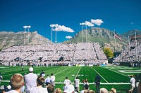 Crowd watching a football league. Original public domain image from Wikimedia Commons