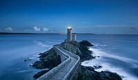 Lighthouse with beautiful ocean scenic background. Original public domain image from Wikimedia Commons