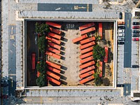 Drone shot of parked buses and cars at depot in Bishan Int, Bishan, Singapore. Original public domain image from Wikimedia Commons