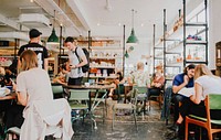 People working and socializing at Barber & Parlour cafe, London, UK - 23 January 2017