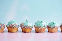 Blue frosting cupcakes and rainbow sprinkles. Original public domain image from <a href="https://commons.wikimedia.org/wiki/File:The_Perfect_Cupcake_(Unsplash).jpg" target="_blank">Wikimedia Commons</a>