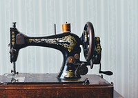 Vintage sewing machine. Original public domain image from <a href="https://commons.wikimedia.org/wiki/File:Antique_sewing_machine_(Unsplash).jpg" target="_blank">Wikimedia Commons</a>
