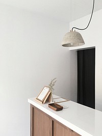 Modern white counter in a store. Original public domain image from Wikimedia Commons