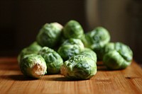 Brussel sprouts on a table.  Original public domain image from Wikimedia Commons