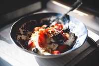 Bowl of fruit and yogurt topped with nuts for a healthy breakfast. Original public domain image from <a href="https://commons.wikimedia.org/wiki/File:Lancaster,_United_States_(Unsplash).jpg" target="_blank" rel="noopener noreferrer nofollow">Wikimedia Commons</a>