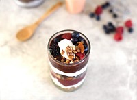 A glass filled with cake, pudding, cream, fruit, berries, and nuts. Original public domain image from <a href="https://commons.wikimedia.org/wiki/File:Healthy_Meal_Prep_(Unsplash).jpg" target="_blank" rel="noopener noreferrer nofollow">Wikimedia Commons</a>