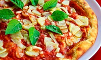 Delicious homemade pizza, Italian food. Original public domain image from Wikimedia Commons