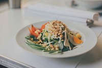 Bowl of salad with egg, vegetables, and nuts. Original public domain image from Wikimedia Commons