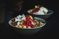 Healthy fruit bowls with coconut, berries, and nuts for breakfast. Original public domain image from Wikimedia Commons