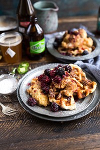 Waffles with berries and syrup at a cafe. Original public domain image from Wikimedia Commons