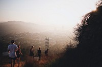 A group of friends hiking during sunrise or sunset in Los Angeles. Original public domain image from <a href="https://commons.wikimedia.org/wiki/File:Jet_Lag_Mountain_(Unsplash).jpg" target="_blank" rel="noopener noreferrer nofollow">Wikimedia Commons</a>