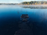 Sky reflecting in a lake. Original public domain image from Wikimedia Commons