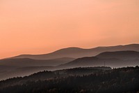 Aesthetic sunset view, mountain background.  Original public domain image from Wikimedia Commons