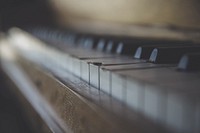 A blurry shot of the surface of a piano keyboard. Original public domain image from Wikimedia Commons