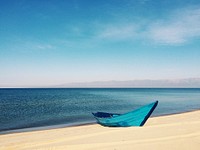 Blue boat on the beach. Original public domain image from Wikimedia Commons