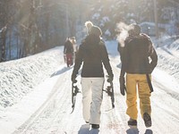 A few snowboarders walking a winter path with visible breath. Original public domain image from <a href="https://commons.wikimedia.org/wiki/File:Snowboarders_breath_on_a_cold_day_(Unsplash).jpg" target="_blank" rel="noopener noreferrer nofollow">Wikimedia Commons</a>