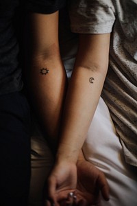 Two person with tattoos. Original public domain image from <a href="https://commons.wikimedia.org/wiki/File:Elizabeth_Tsung_2017-01-17_(Unsplash).jpg" target="_blank">Wikimedia Commons</a>