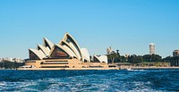 The building of the Sydney Opera House seen from the water. Original public domain image from Wikimedia Commons