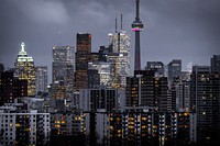 Lights in the windows of high-rises in Toronto on a cloudy evening. Original public domain image from Wikimedia Commons