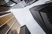 A low-angle shot of several distinct skyscraper facades in Toronto. Original public domain image from Wikimedia Commons