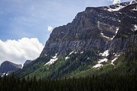 The rocky snow-covered slopes and forest valley at the Banff National Park. Original public domain image from <a href="https://commons.wikimedia.org/wiki/File:Forest_Valley,_Banff_National_Park_(Unsplash_F5I2QlP8X9w).jpg" target="_blank" rel="noopener noreferrer nofollow">Wikimedia Commons</a>