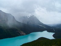 The beautiful Peyto Lake in British Columbia under gray clouds. Original public domain image from Wikimedia Commons