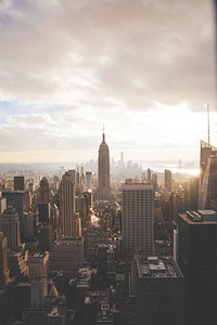 View of the New York City skyline and Empire State building from another skyscraper. Original public domain image from <a href="https://commons.wikimedia.org/wiki/File:Only_in_New_York_(Unsplash).jpg" target="_blank" rel="noopener noreferrer nofollow">Wikimedia Commons</a>