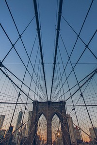 Brooklyn Bridge in New York City. Original public domain image from <a href="https://commons.wikimedia.org/wiki/File:Brooklyn_Bridge,_New_York,_United_States_(Unsplash_upFFOsvM1h4).jpg" target="_blank">Wikimedia Commons</a>
