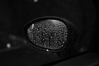 Raindrops on wing mirror. Original public domain image from Wikimedia Commons