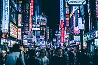 Busy street of the Shibuya district during nighttime. TOKYO, JAPAN - 12 MAY 2017Original public domain image from Wikimedia Commons