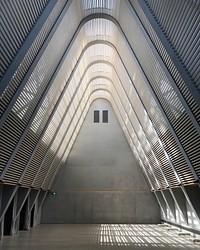 Triangle arch interior in CHAO Hotel & Clubhouse, Beijing, China.Original public domain image from Wikimedia Commons