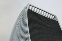 The corner of a curved skyscraper in London. Original public domain image from Wikimedia Commons