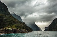 Stormy day in Milford Sound - The Gates to Heaven. Original public domain image from <a href="https://commons.wikimedia.org/wiki/File:Milford_Sound_-_The_Gates_to_Heaven_(Unsplash).jpg" target="_blank">Wikimedia Commons</a>