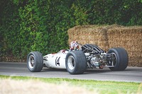 Race car on track. Original public domain image from <a href="https://commons.wikimedia.org/wiki/File:Goodwood_Festival_of_Speed_(W_Bound),_Chichester_(Unsplash).jpg" target="_blank">Wikimedia Commons</a>