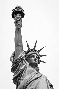 Close up of Statue of Liberty in black & white, neoclassical sculpture, New York City, New York. Original public domain image from Wikimedia Commons