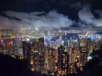 The intensely bright skyline of Hong Kong at night. Original public domain image from Wikimedia Commons