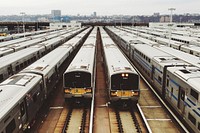 Rail station with many trains on the tracks in New York. Original public domain image from Wikimedia Commons