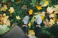 Man standing on fallen maple leaves Original public domain image from <a href="https://commons.wikimedia.org/wiki/File:Padua,_Italy_(Unsplash).jpg" target="_blank">Wikimedia Commons</a>