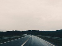 Driving on a cloudy day. Original public domain image from <a href="https://commons.wikimedia.org/wiki/File:Brigitte_Tohm_2016-01-05_(Unsplash).jpg" target="_blank">Wikimedia Commons</a>