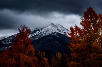 An impressive mountain peak enveloped in gray clouds in Silverthorne. Original public domain image from <a href="https://commons.wikimedia.org/wiki/File:Cloudy_autumn_afternoon_in_Silverthorne_mountains_(Unsplash).jpg" target="_blank" rel="noopener noreferrer nofollow">Wikimedia Commons</a>